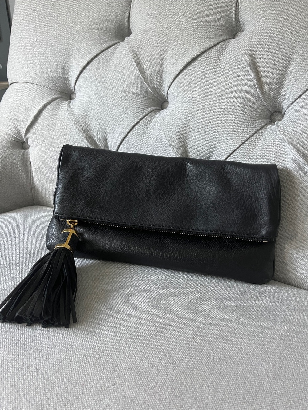 Michael Kors Black leather fold over clutch!